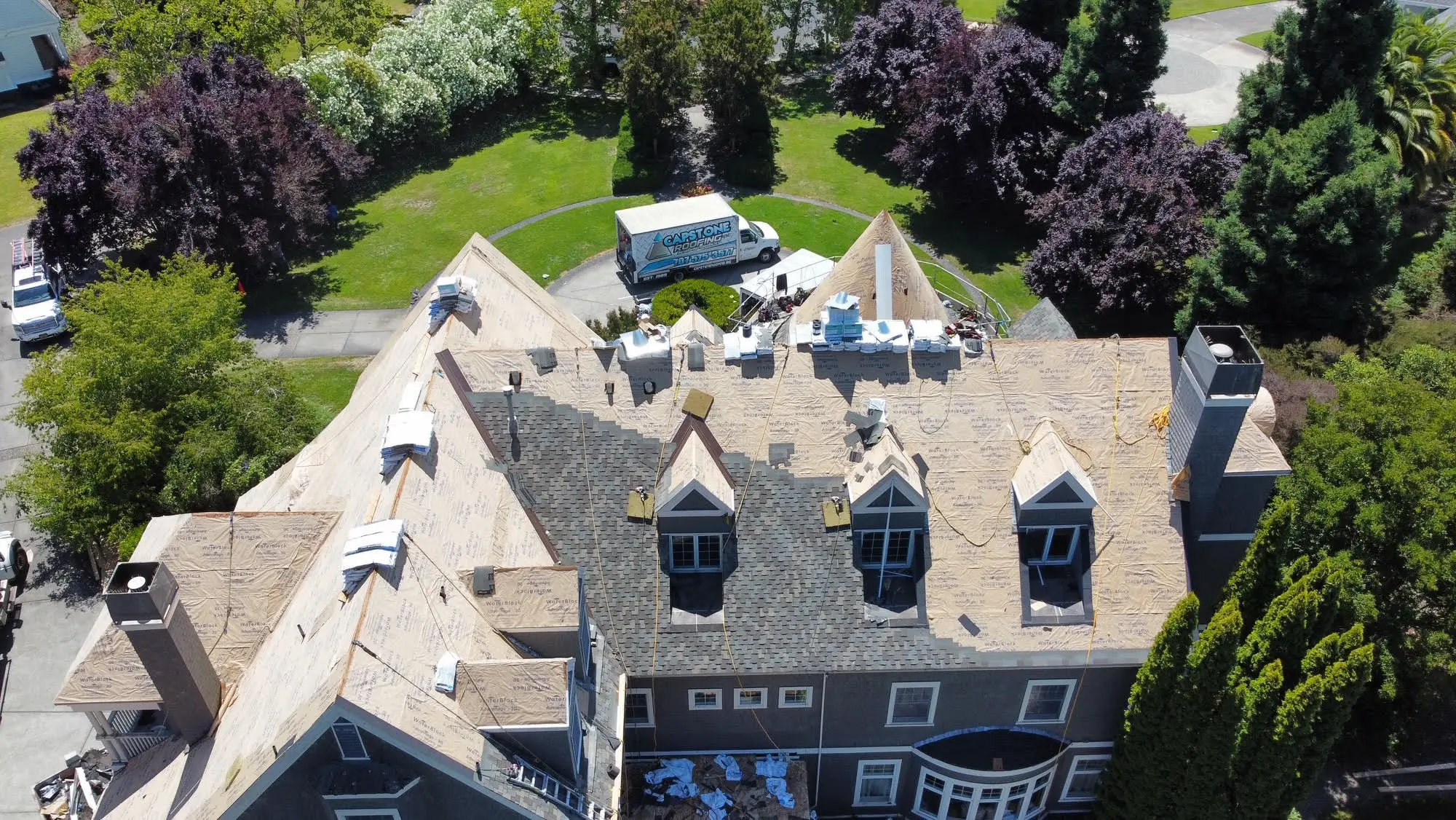 Capstone crew working on a North Bay roof