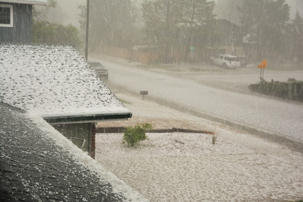 hail covering asphalt shingle roof