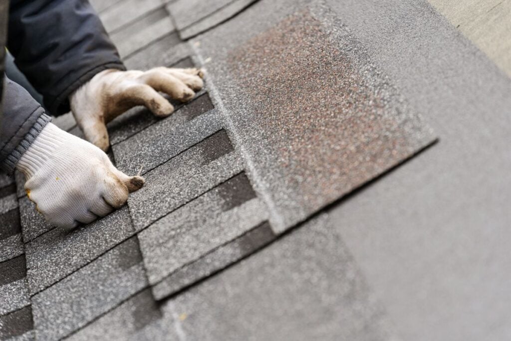 asphalt shingles being installed