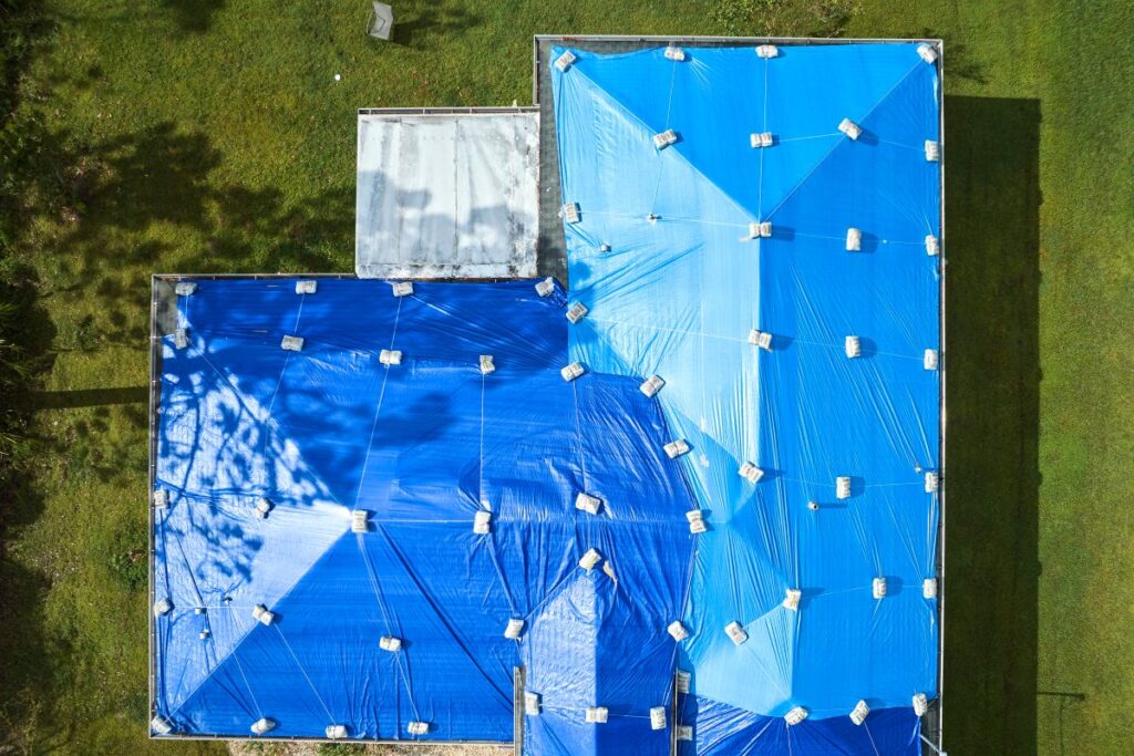 how to tarp a roof aerial view house with patio