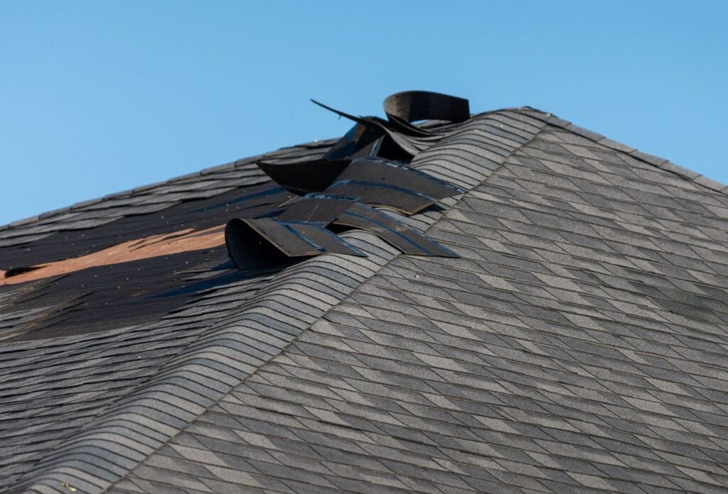 how to file a roof insurance claim grey shingles missing wind damage